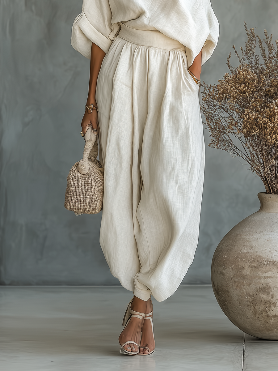 Natalia – Tuta Elegante con Scollatura Asimmetrica