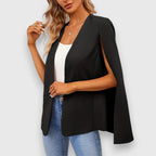 Nela – Elegante giacca nera in stile mantella.