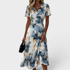 Elara - Vestito Midi Floreale con Fiocco in Vita