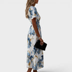 Elara - Vestito Midi Floreale con Fiocco in Vita