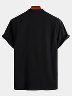 Camicia da uomo a maniche corte in tinta unita con colletto alla coreana e tasca frontale
