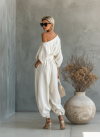Natalia – Tuta Elegante con Scollatura Asimmetrica