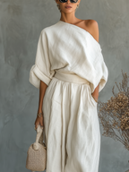 Natalia – Tuta Elegante con Scollatura Asimmetrica